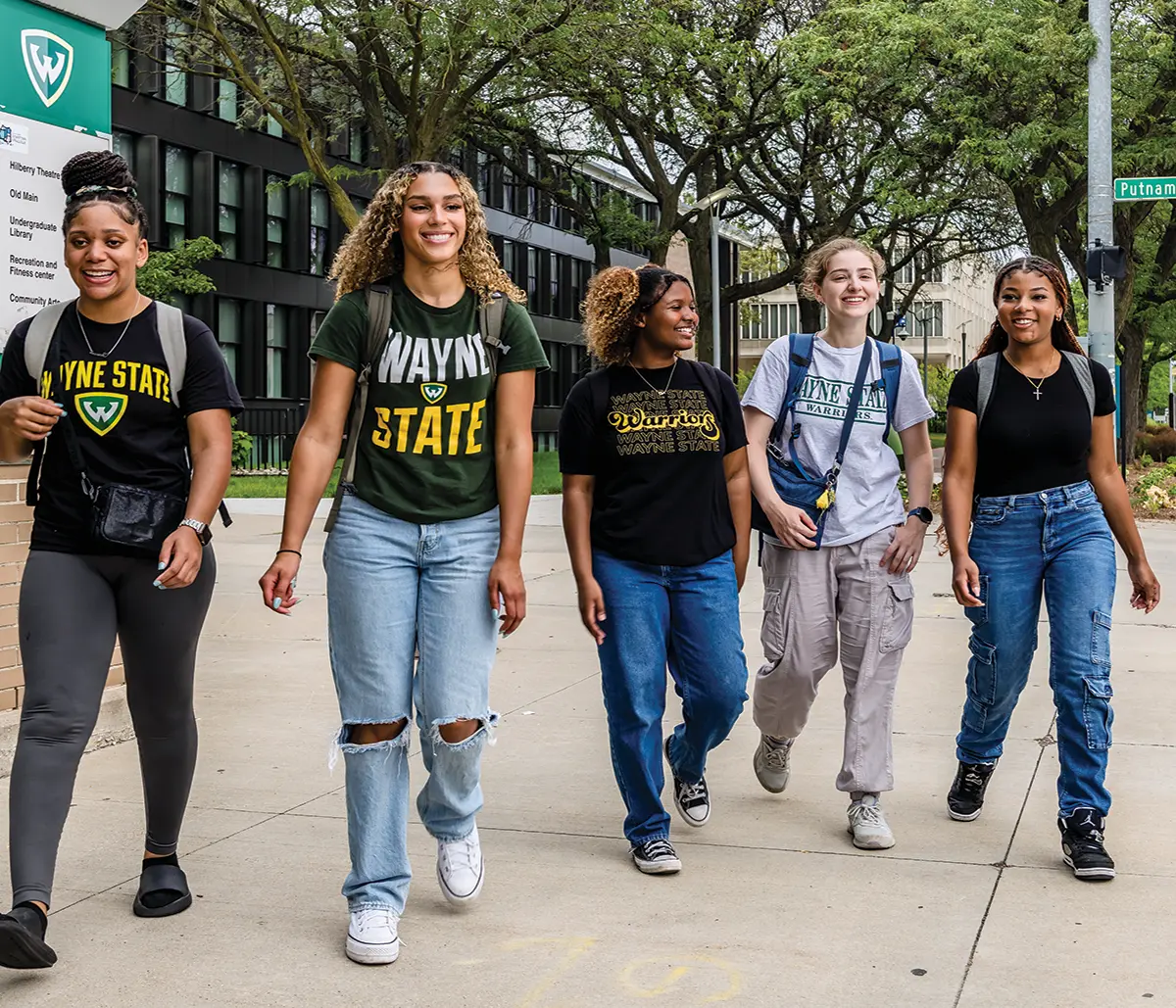 students wearing WSU merch