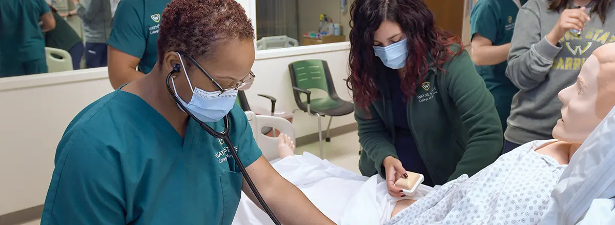 nursing student and instructor