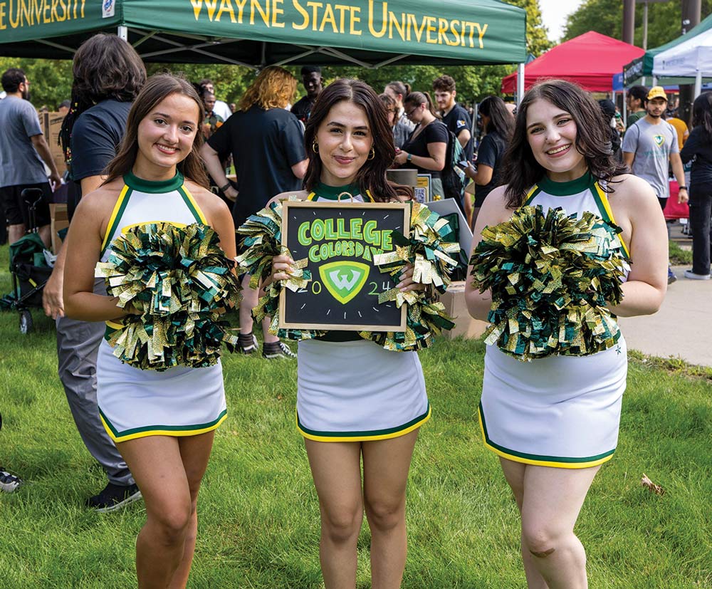 three Wayne State University cheerleaders
