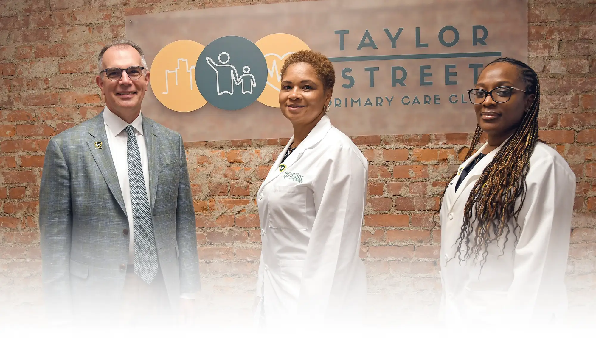 three staff members from Taylor Street